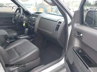2010 Ford Escape Limited z VIN 1FMCU0E72AKD30702, wystawiony jako IAAI lot #42093802 z przebiegiem 155 572 mil mil oraz . Historia ofert i sprzedaży dostępna na DreamBid. Obrazek 5.