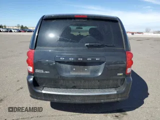 2014 Dodge Grand Caravan SE with VIN 2C4RDGBG2ER341797, listed as a Copart auction lot 49439405 with 102,633 mi miles and Salvage Title. Bid and sale history available at DreamBid. Image 6.