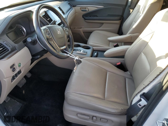 2021 Honda Ridgeline RTL-E with VIN 5FPYK3F74MB019684, listed as a Copart auction lot 42140235 with 31,223 mi miles and Salvage title. Bid and sale history available at DreamBid. Image 7.