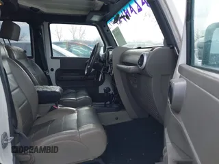 2010 Jeep Wrangler Unlimited Sahara with VIN 1J4HA5H19AL177179, listed as a IAAI auction lot 41565342 with 181,392 mi miles. Bid and sale history available at carsss.com. Image 5.