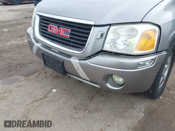 2005 GMC Envoy SLT with VIN 1GKDT13S352129944, listed as a IAAI auction lot 41527180 with 188,541 mi miles. Bid and sale history available at carsss.com. Image 6.