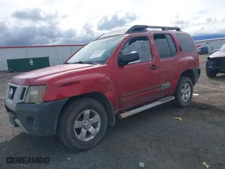 2011 Nissan Xterra Pro-4X with VIN 5N1AN0NW9BC500965, listed as a IAAI auction lot 41903878 with 255,144 mi miles. Bid and sale history available at carsss.com. Image 2.