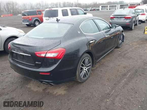 2017 Maserati Ghibli with VIN ZAM57XSA3H1197716, listed as a IAAI auction lot 41918916 with 47,779 mi miles. Bid and sale history available at carsss.com. Image 4.