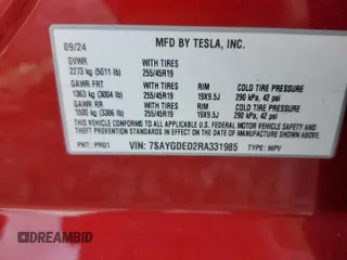 2024 Tesla Model Y with VIN 7SAYGDED2RA331985, listed as a Copart auction lot 60240705 with Not provided miles and Salvage title. Bid and sale history available at DreamBid. Image 12.
