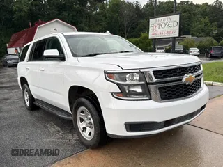 2019 Chevrolet Tahoe Commercial with VIN 1GNLCDECXKR281986, listed as a Copart auction lot 63148895 with 103,693 mi miles and Clean title. Bid and sale history available at DreamBid. Image 1.
