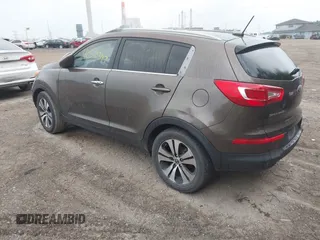 2013 Kia Sportage EX z VIN KNDPC3A28D7449821, wystawiony jako IAAI lot #42510347 z przebiegiem 194 084 mil mil oraz . Historia ofert i sprzedaży dostępna na DreamBid. Obrazek 3.