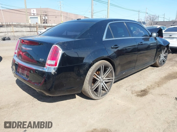 2014 Chrysler 300 with VIN 2C3CCAAG3EH285743, listed as a IAAI auction lot 41773664 with 182,034 mi miles. Bid and sale history available at carsss.com. Image 4.