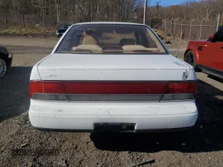 1994 Nissan Maxima z VIN JN1HJ01F0RT230431, wystawiony jako Copart lot #50020135 z przebiegiem 116 846 mil mil oraz Szkody całkowita. Historia ofert i sprzedaży dostępna na DreamBid. Obrazek 6.