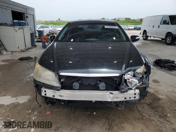 2005 Acura RL z VIN JH4KB16535C018850, wystawiony jako Copart lot #59306055 z przebiegiem 131 881 mil mil oraz Szkoda całkowita • Salvage title. Historia ofert i sprzedaży dostępna na DreamBid. Obrazek 5.