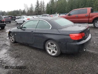 2012 BMW 3 Series 335i with VIN WBADX7C56CE744932, listed as a Copart auction lot 87005144 with 127,439 mi miles and Clean title. Bid and sale history available at DreamBid. Image 2.
