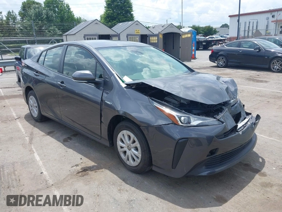 2021 Toyota Prius L Eco z VIN JTDKAMFU3M3152785, wystawiony jako IAAI lot #42501351 z przebiegiem 60 489 mil mil oraz . Historia ofert i sprzedaży dostępna na DreamBid. Obrazek 1.