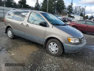1999 Toyota Sienna LE with VIN 4T3ZF13C0XU133039, listed as a Copart auction lot 51162645 with 182,318 mi miles and Salvage Title. Bid and sale history available at carsss.com. Image 4.