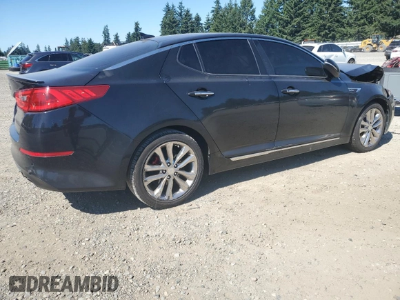 2015 Kia Optima SX Turbo with VIN 5XXGR4A63FG517153, listed as a Copart auction lot 65068985 with 153,482 mi miles and Salvage title. Bid and sale history available at DreamBid. Image 3.