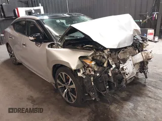 2016 Nissan Maxima SV z VIN 1N4AA6AP4GC415952, wystawiony jako IAAI lot #41806306 z przebiegiem 131 612 mil mil oraz . Historia ofert i sprzedaży dostępna na DreamBid. Obrazek 1.