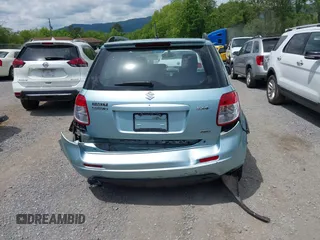 2009 Suzuki SX4 Touring AWD z VIN JS2YB417096201672, wystawiony jako IAAI lot #42209018 z przebiegiem 64 879 mil mil oraz . Historia ofert i sprzedaży dostępna na DreamBid. Obrazek 17.