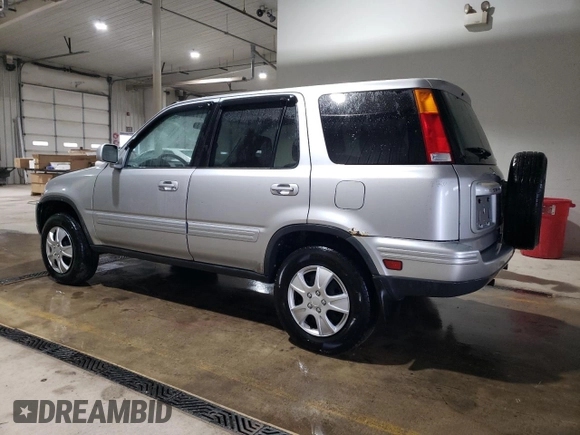2001 Honda CR-V SE with VIN JHLRD18731C035881, listed as a Copart auction lot 52574575 with 192,107 mi miles and Salvage Title. Bid and sale history available at carsss.com. Image 2.