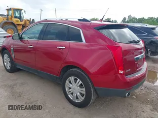 2014 Cadillac SRX Luxury Collection z VIN 3GYFNBE39ES576335, wystawiony jako IAAI lot #42093334 z przebiegiem 69 804 mil mil oraz . Historia ofert i sprzedaży dostępna na DreamBid. Obrazek 3.