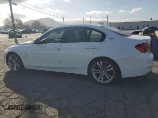 2017 BMW 3 Series 330e iPerformance with VIN WBA8E1C53HK480307, listed as a Copart auction lot 47618215 with 74,924 mi miles and Salvage Title. Bid and sale history available at carsss.com. Image 2.