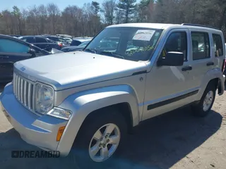 2011 Jeep Liberty Sport with VIN 1J4PN2GK9BW575064, listed as a IAAI auction lot 42062056 with 152,693 mi miles. Bid and sale history available at carsss.com. Image 2.