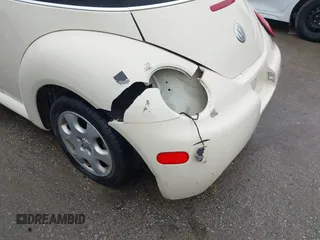 2003 Volkswagen Beetle GLS with VIN 3VWCK21Y43M315003, listed as a IAAI auction lot 41914125 with Not Provided miles and . Bid and sale history available at DreamBid. Image 6.