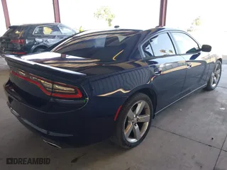 2015 Dodge Charger SE with VIN 2C3CDXBG2FH835787, listed as a IAAI auction lot 42069235 with 119,805 mi miles. Bid and sale history available at carsss.com. Image 4.