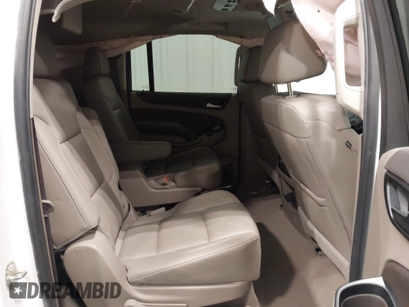 2020 Chevrolet Suburban LT with VIN 1GNSKHKC5LR108971, listed as a IAAI auction lot 41651417 with 90,674 mi miles. Bid and sale history available at carsss.com. Image 8.