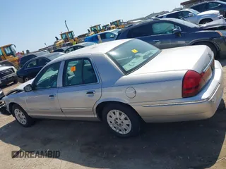 2005 Mercury Grand Marquis GS with VIN 2MEFM74W05X653375, listed as a IAAI auction lot 41995502 with 200,083 mi miles and . Bid and sale history available at DreamBid. Image 14.