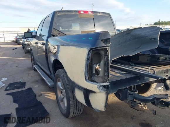 2014 Ram 1500 Big Horn with VIN 1C6RR6LT8ES403684, listed as a IAAI auction lot 41076858 with 130,527 mi miles and . Bid and sale history available at DreamBid. Image 3.