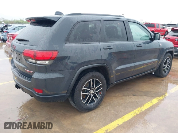 2018 Jeep Grand Cherokee Trailhawk with VIN 1C4RJFLG6JC320763, listed as a IAAI auction lot 41871683 with 115,417 mi miles and . Bid and sale history available at DreamBid. Image 4.
