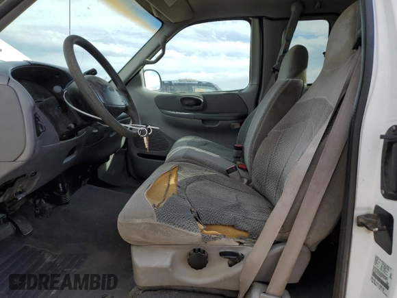 1999 Ford F-150 with VIN 2FTRX17L0XCA37979, listed as a Copart auction lot 58216695 with 256,055 mi miles and Clean title. Bid and sale history available at DreamBid. Image 7.