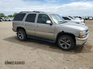 2000 Chevrolet Tahoe LT with VIN 1GNEK13T1YJ111424, listed as a Copart auction lot 58377725 with 234,034 mi miles and Salvage title. Bid and sale history available at DreamBid. Image 4.