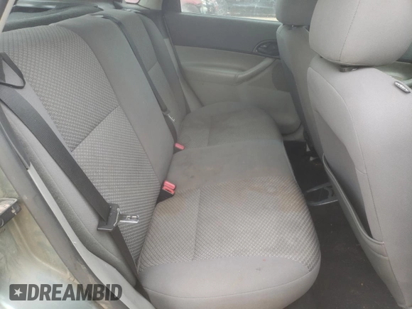 2006 Ford Focus S with VIN 1FAHP37N76W180039, listed as a Copart auction lot 58328565 with 220,696 mi miles and Salvage title. Bid and sale history available at DreamBid. Image 11.