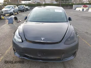 2023 Tesla Model 3 Long Range with VIN 5YJ3E1EB7PF681784, listed as a IAAI auction lot 41534837 with 20,882 mi miles and . Bid and sale history available at DreamBid. Image 13.