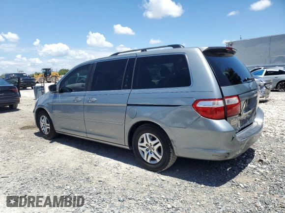 2007 Honda Odyssey EX z VIN 5FNRL38467B027951, wystawiony jako Copart lot #60109725 z przebiegiem 137 718 mil mil oraz Szkoda całkowita • Salvage title. Historia ofert i sprzedaży dostępna na DreamBid. Obrazek 2.