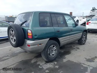 1998 Toyota RAV4 with VIN JT3GP10V9W7032820, listed as a IAAI auction lot 42046186 with 312,888 mi miles. Bid and sale history available at carsss.com. Image 4.