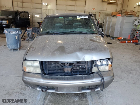 2003 GMC Sonoma SLS with VIN 1GTDT19X038102919, listed as a Copart auction lot 63662154 with 0 mi miles and Salvage Title. Bid and sale history available at carsss.com. Image 5.