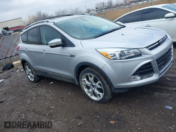 2013 Ford Escape Titanium with VIN 1FMCU9J90DUC22888, listed as a IAAI auction lot 41664550 with 185,568 mi miles and . Bid and sale history available at DreamBid. Image 1.
