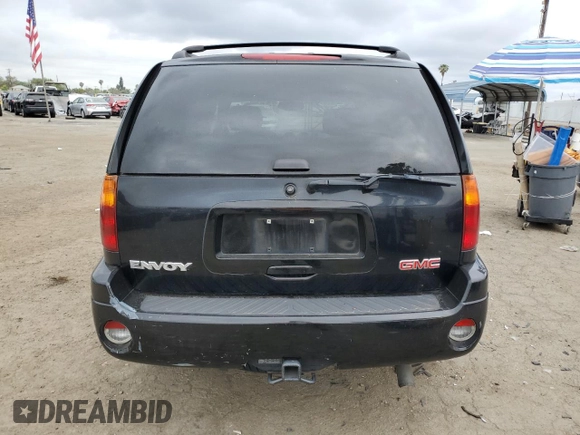 2004 GMC Envoy SLE with VIN 1GKDT13S442155788, listed as a Copart auction lot 50270135 with 164,271 mi miles and Salvage Title. Bid and sale history available at carsss.com. Image 6.