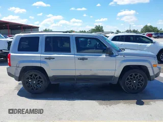 2014 Jeep Patriot Sport z VIN 1C4NJPBA7ED818830, wystawiony jako IAAI lot #42216964 z przebiegiem 144 909 mil mil oraz . Historia ofert i sprzedaży dostępna na DreamBid. Obrazek 13.