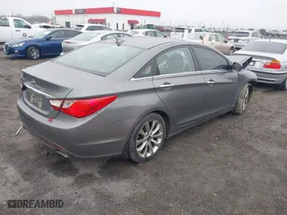 2013 Hyundai Sonata SE with VIN 5NPEC4AC4DH770868, listed as a IAAI auction lot 41504401 with 220,124 mi miles. Bid and sale history available at carsss.com. Image 4.