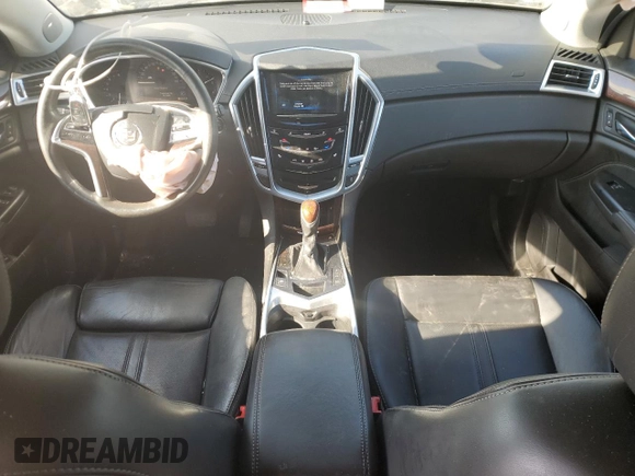 2016 Cadillac SRX Performance Collection with VIN 3GYFNCE38GS576027, listed as a Copart auction lot 52863115 with 85,615 mi miles and Salvage title. Bid and sale history available at DreamBid. Image 8.