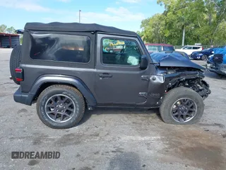 2021 Jeep Wrangler Sport S with VIN 1C4GJXAN7MW691190, listed as a IAAI auction lot 42028528 with 24,207 mi miles and . Bid and sale history available at carsss.com. Image 14.