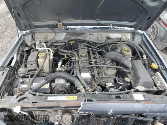 1999 Jeep Cherokee SE with VIN 1J4FF28S9XL576313, listed as a Copart auction lot 88470435 with Not provided miles and Salvage title. Bid and sale history available at DreamBid. Image 13.
