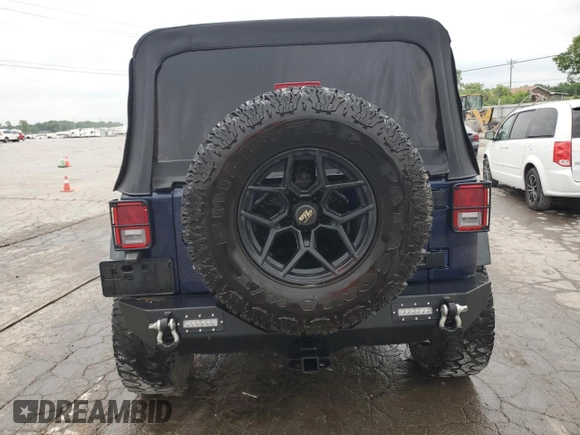 2013 Jeep Wrangler Unlimited Sport с VIN 1C4BJWDGXDL521666, выставлен на аукционе Copart как лот 57277255 с пробегом 158 793 миль миль и Списание • Salvage title. История ставок и продаж доступна на DreamBid. Изображение 6.