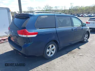 2012 Toyota Sienna LE AAS with VIN 5TDKK3DC7CS274726, listed as a IAAI auction lot 42126219 with 184,158 mi miles. Bid and sale history available at carsss.com. Image 4.
