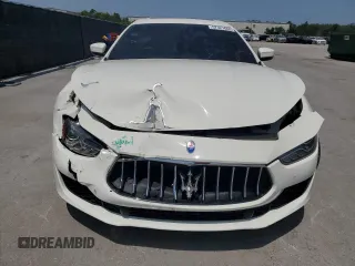 2019 Maserati Ghibli z VIN ZAM57XSA6K1319461, wystawiony jako Copart lot #57321665 z przebiegiem Nie podano mil oraz Tytuł czysty. Historia ofert i sprzedaży dostępna na DreamBid. Obrazek 5.
