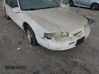 1996 Ford Thunderbird LX with VIN 1FALP62W4TH154400, listed as a IAAI auction lot 41394723 with 65,860 mi miles and . Bid and sale history available at DreamBid. Image 6.