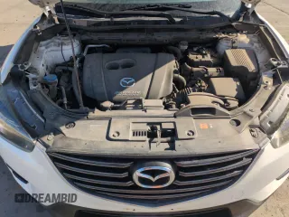 2016 Mazda CX-5 Grand Touring with VIN JM3KE4DY8G0671256, listed as a Copart auction lot 52920975 with 87,822 mi miles and Non Repairable. Bid and sale history available at carsss.com. Image 12.