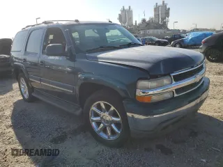 2005 Chevrolet Tahoe LT z VIN 1GNEC13T75R167992, wystawiony jako Copart lot #50202265 z przebiegiem 243 156 mil mil oraz Czysty tytuł • Clean title. Historia ofert i sprzedaży dostępna na DreamBid. Obrazek 4.