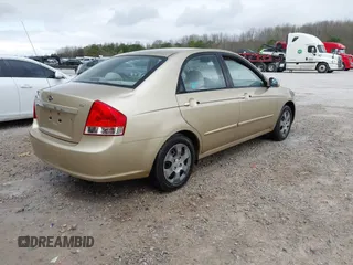 2009 Kia Spectra EX with VIN KNAFE221795665455, listed as a IAAI auction lot 41826035 with 163,073 mi miles. Bid and sale history available at carsss.com. Image 4.
